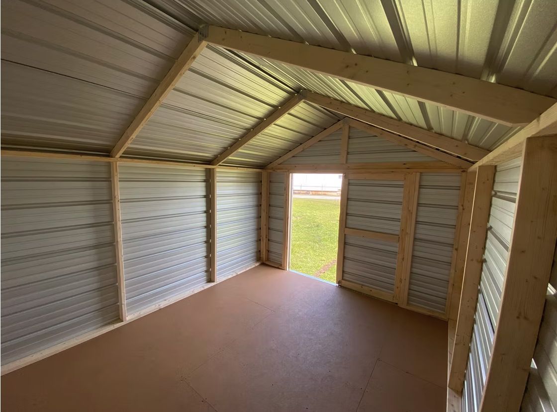 Economy shed interior looking toward an open door